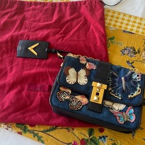 Valentino Rockstud embroidered butterflies denim